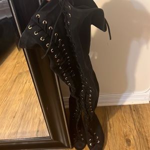 These black over the knee boots